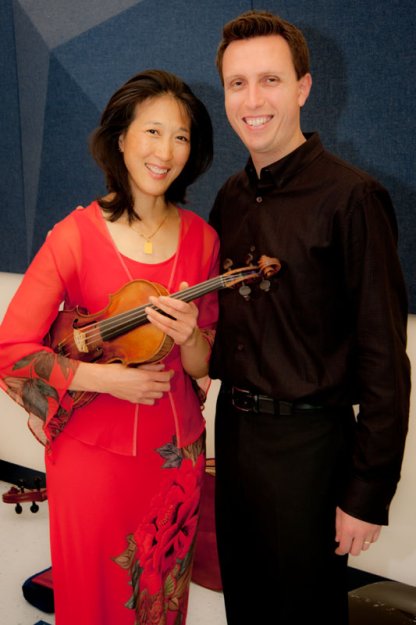 Matthew Fritz,  Music Director and Conductor of the Parkway Concert Orchestra with Lucia Lin, guest Soloist at the May 20, 2012 concert.